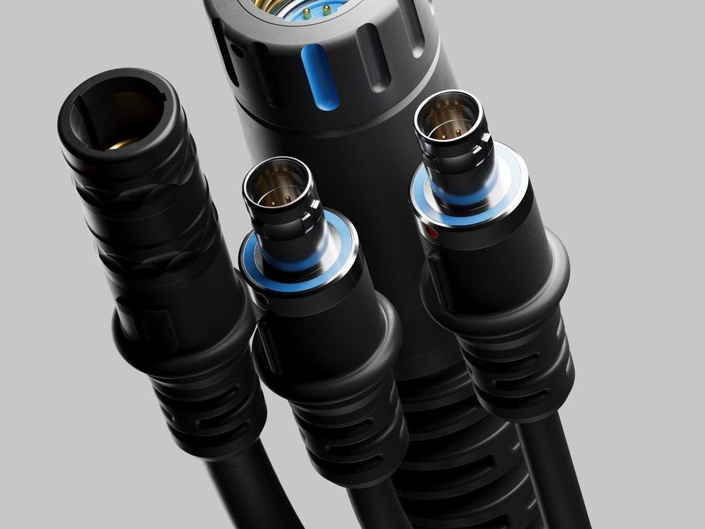 Close-up of PC-4531 Nemesis 19-pin receptacle and dual ODU 7-pin plugs