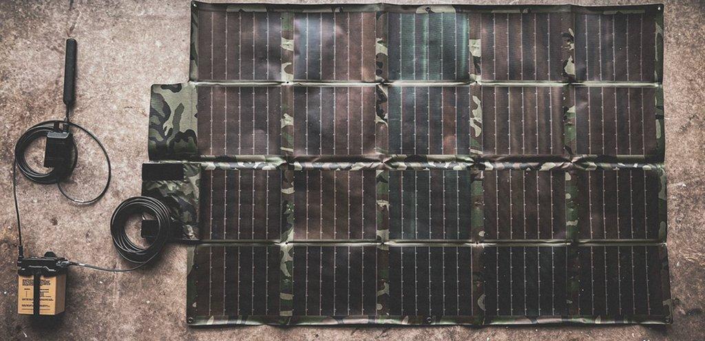 Austere Solar Solution laid out: folding panel, BB-2590 with top hat, cabling and a MANET radio